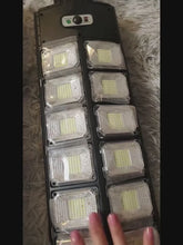 Load and play video in Gallery viewer, Solar Street Light, 4500mAh 504 LED Solar Parking Lot Street Light, Solar Wall Light, Solar Flood Light (Wide Angle Motion Sensor And Remote Control) For Area Lighting